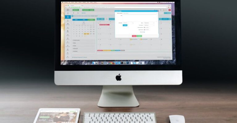 Pc - Silver Imac, Apple Magic Keyboard, and Magic Mouse on Wooden Table