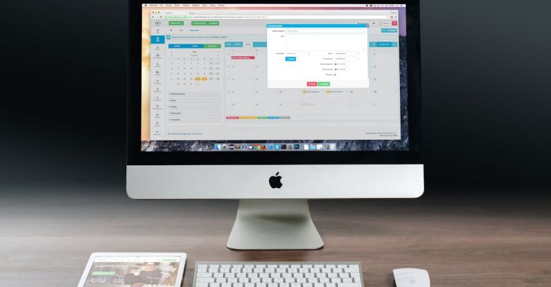 Pc - Silver Imac, Apple Magic Keyboard, and Magic Mouse on Wooden Table