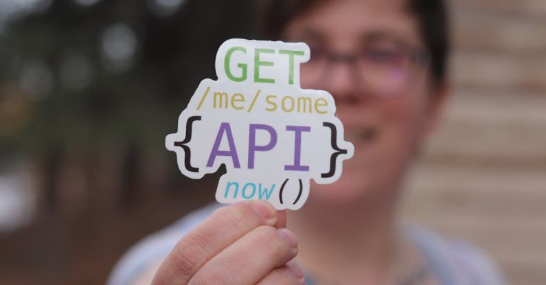 API Errors - Programmer Holding a Paper Cutout with an API Quote